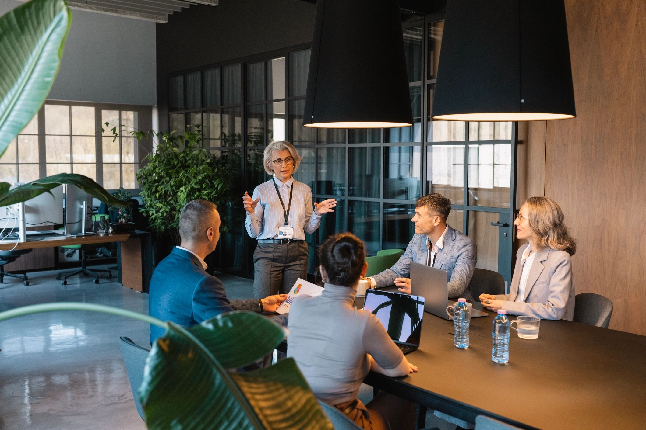 Business technology team collaborating in a boardroom
